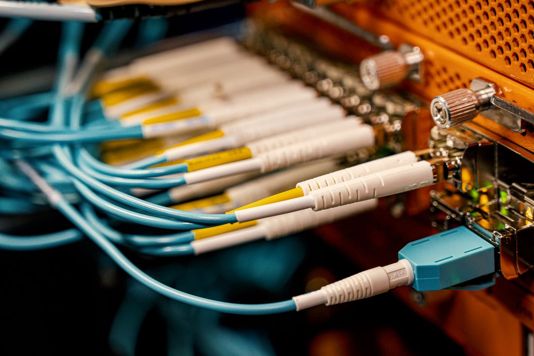 High-count fiber optic terminations on a patch panel